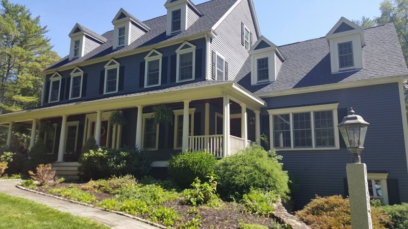 Boxford MA home with blue vinyl siding