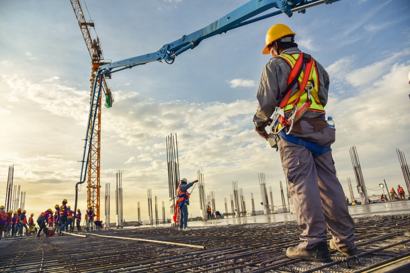 construction worker looking at work