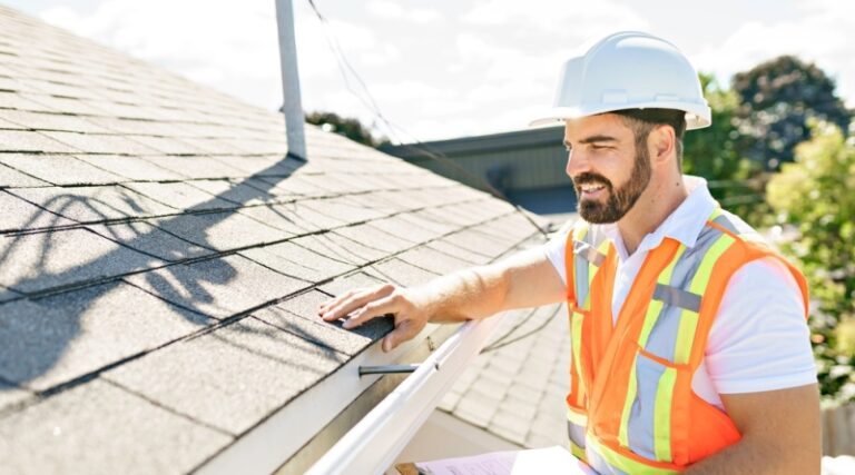 Man Inspecting the Roof