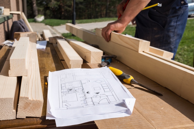Man Planning Out His Construction Work Outside
