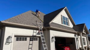 Roofer Inspecting a Roof